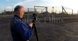 Filming a news report at the Hungarian border