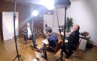 Interviewing a medical participant at a breast cancer conference in Austria Center for a US client