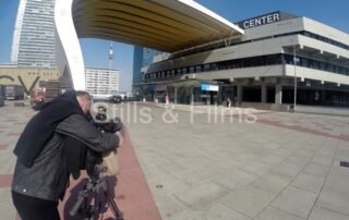 Our DOP filming outside of the Austria Center in Vienna at a breast cancer conference