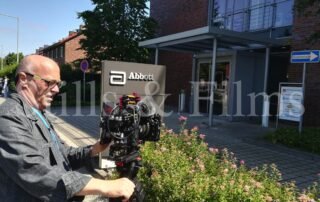 Video Crew Frankfurt cameraman filming a corporate b-roll